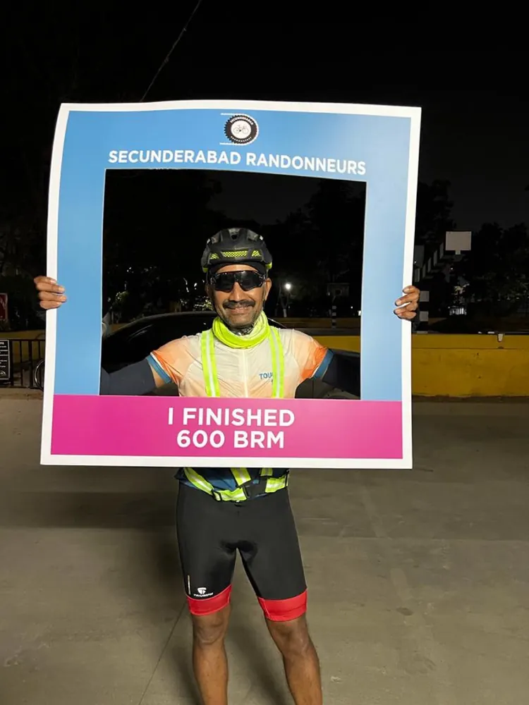 Holding an I finished 600 BRM frame from Secunderabad Randonneurs