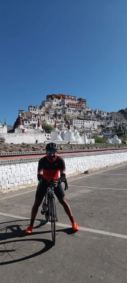 On the bicycle in front of Thiksey monastery, Ladakh